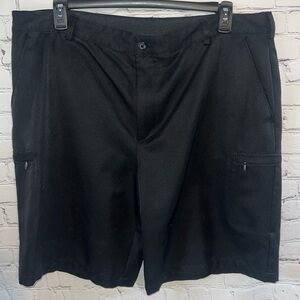 Izod Golf shorts. Size 42. Excellent like new condition. Black. Pockets.